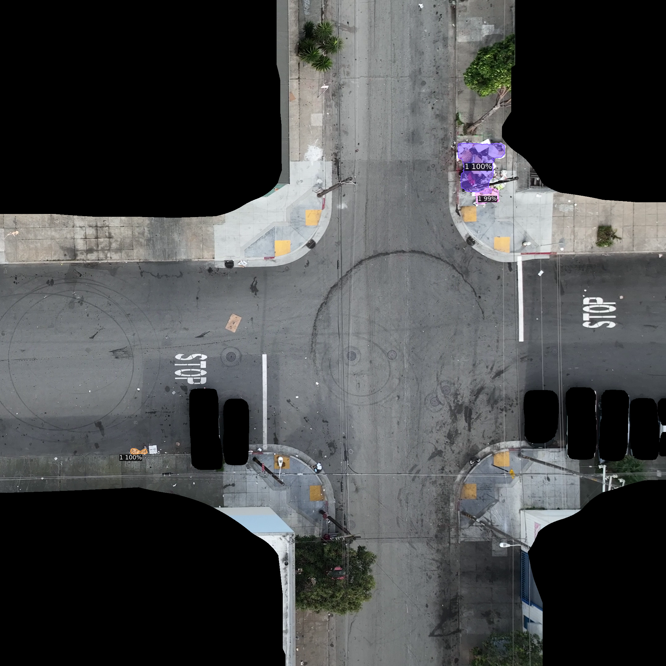 AI simultaneously masking vehicles and detecting waste at intersection